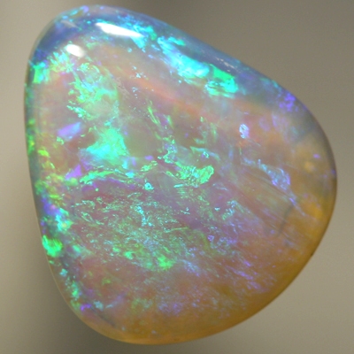 SOLID CRYSTAL OPAL Beautiful green and blues sparkle in a 3D pattern with a hue of purple through out